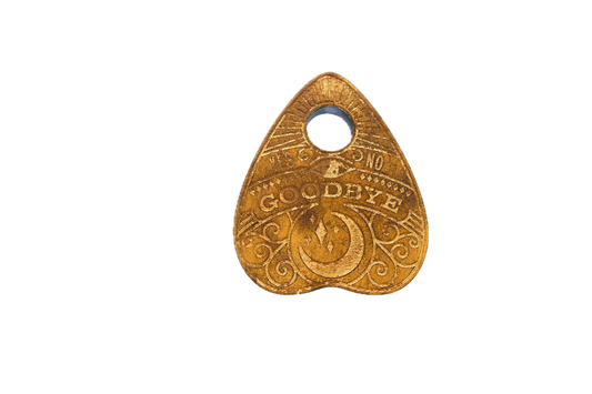 A hand-engraved wood planchette for talking-board work - sunburst crown, GOODBYE banner, open viewing window.
