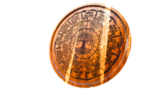 A round acacia tray engraved with all eight Sabbats, the Celtic tree calendar, and the year's named moons around a central Tree of Life.